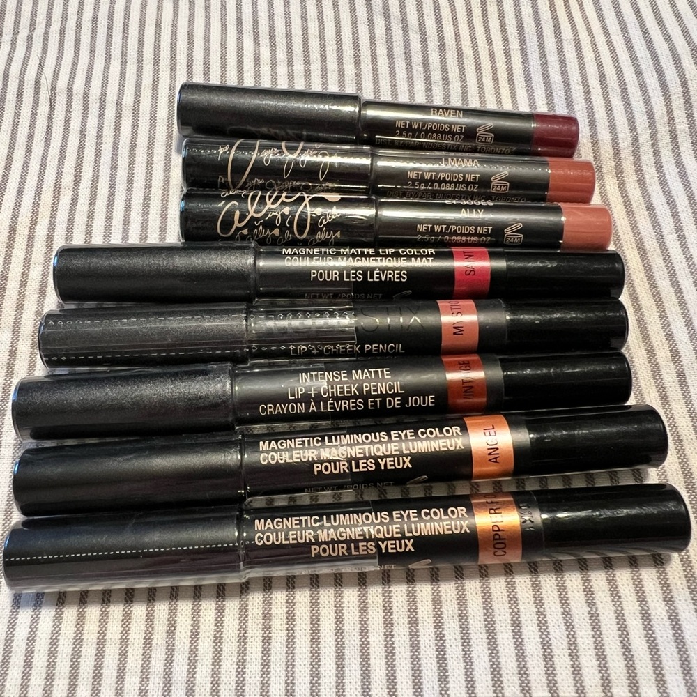 8 unopened and brand new Nudestix products and one Summer Fridays pouch.